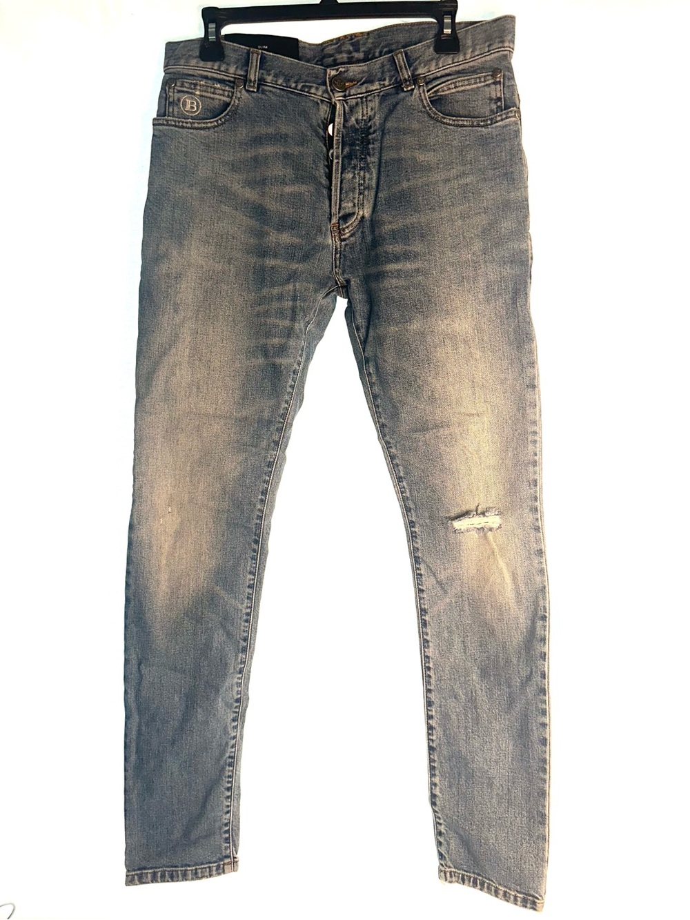 Balmain Men's Slim Jeans in Faded Blue Wash with distressing details (PM100204)